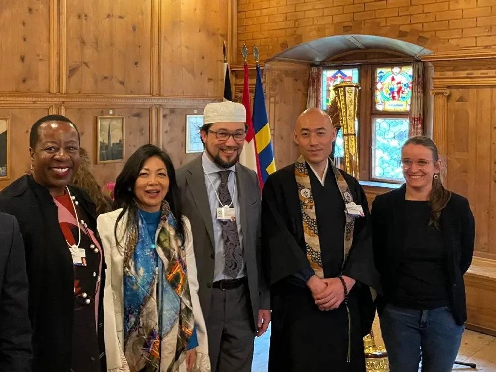 due pastori, imam yahya pallavicini e un monaco buddista, davos 2025